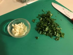photo of chopped garlic and parsley